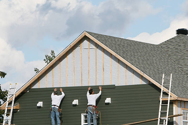 Professional Emergency Siding Repair technician working in Litchfield, OH